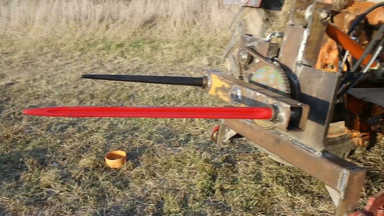 Homemade Bale Unwrapper. Round bale unroller. Make bale unwrapper machine.