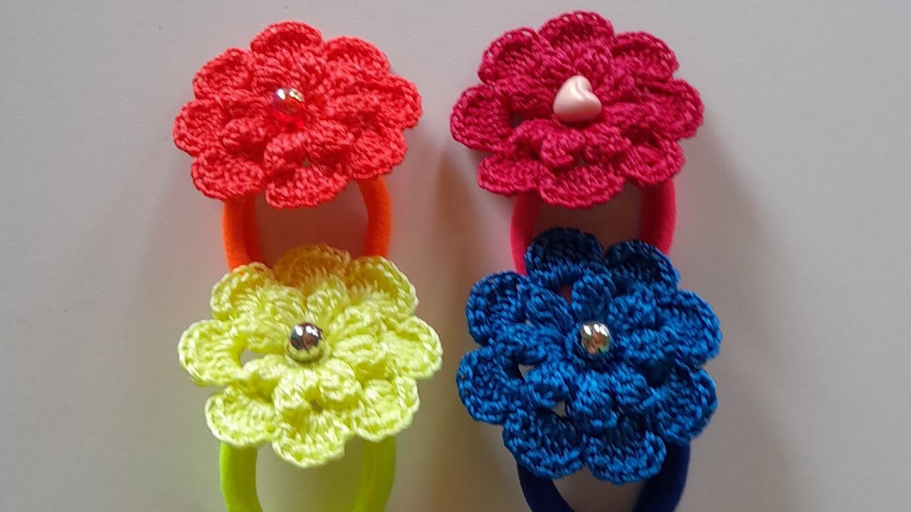 XUXINHAS DE CABELO COM FLOR EM CROCHÊ PASSO A PASSO