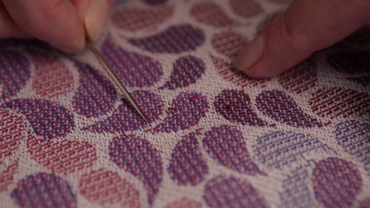 Fixing a pull in a woven wrap