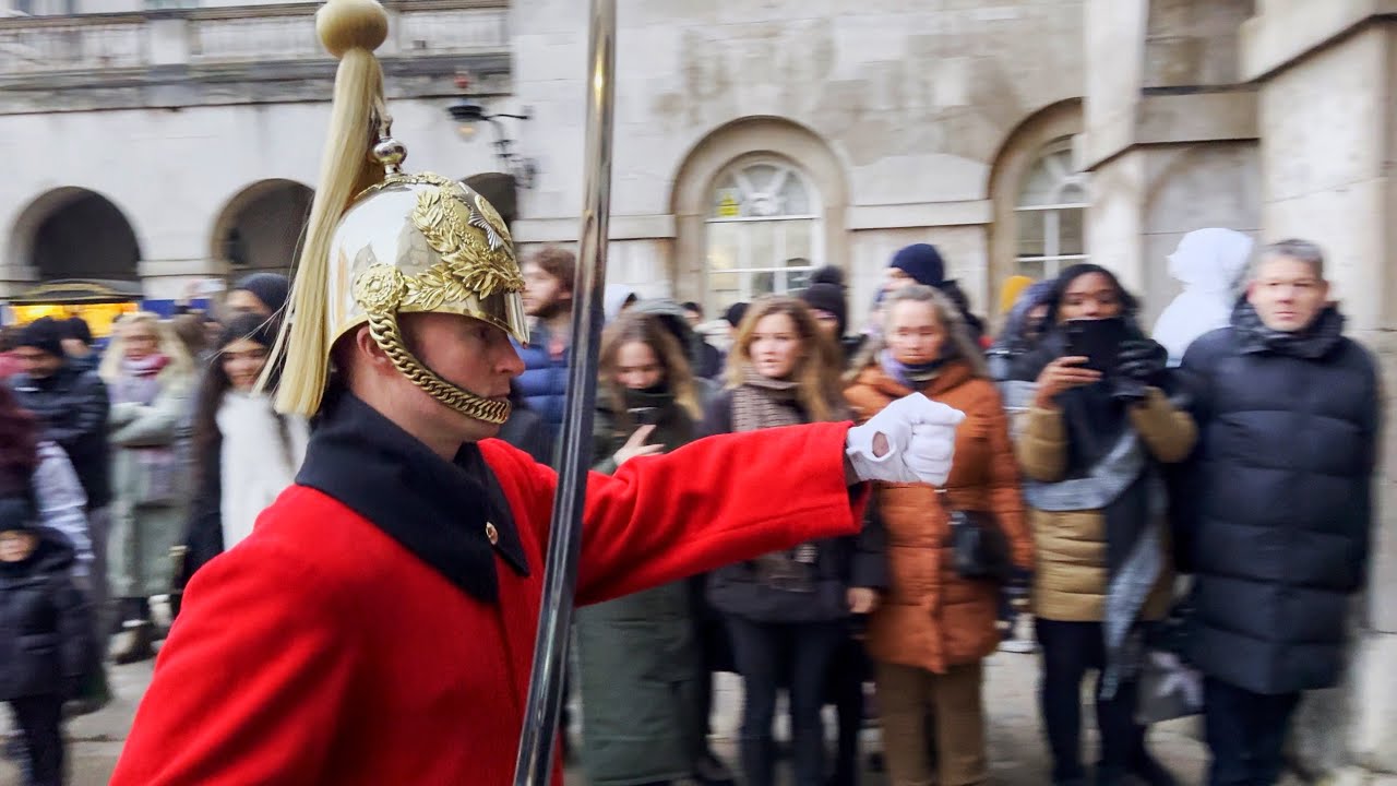 KING'S LIFE GUARDS END OF DAY PARADE IN WINTER CLOAKS AND NO HORSE DISMOUNT at horse guards