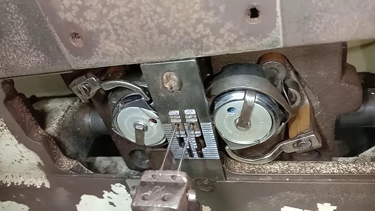 Two needle machine needle and feed dog position timing.