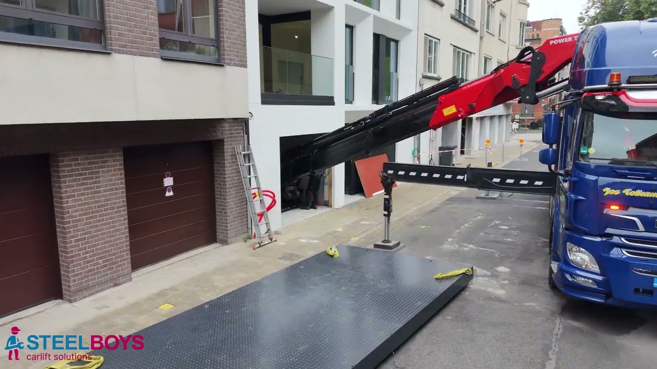 Turn Key Car Lift Installation – CLX-MIX with Sectional Overhead Doors