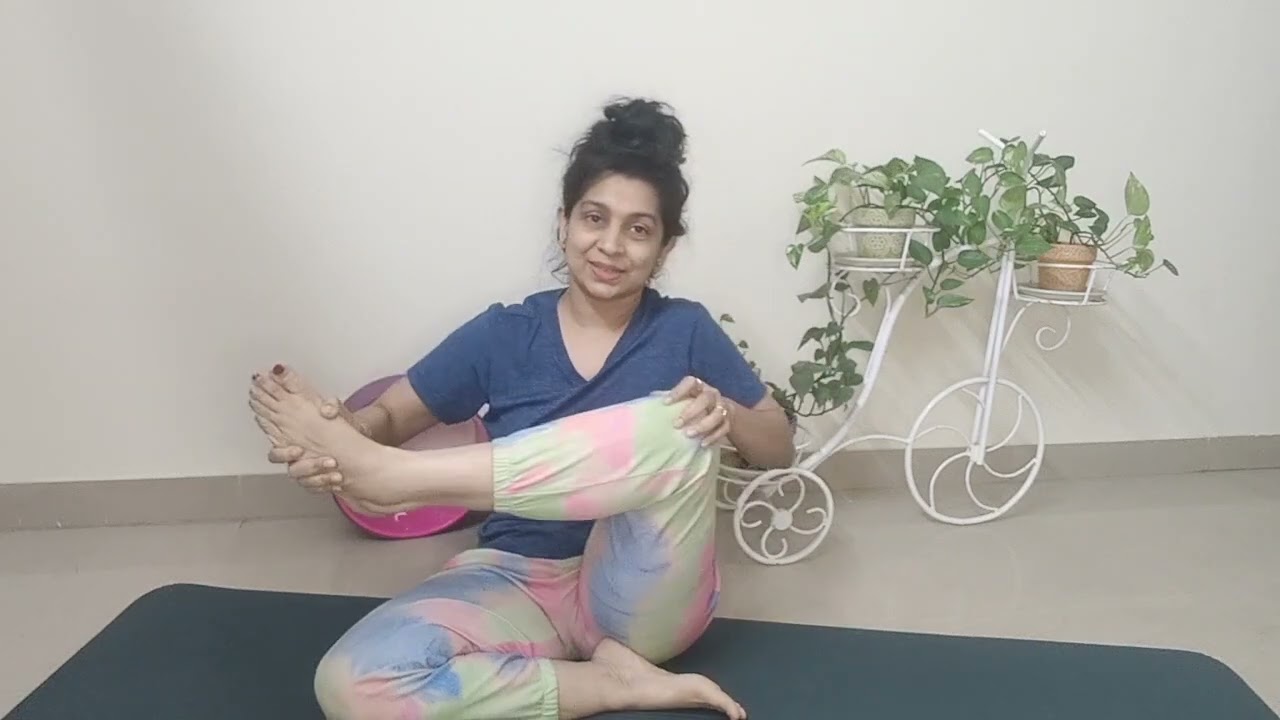 step by step for Akarna Dhanurasan