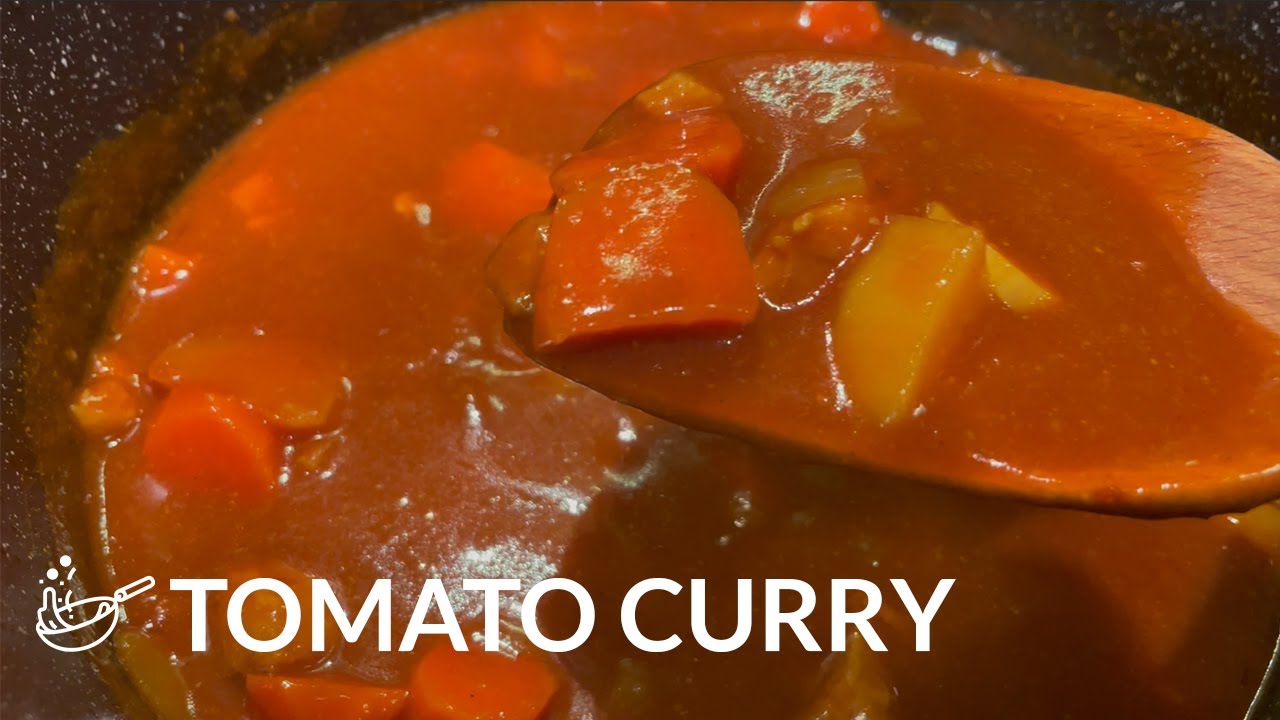 Cooking a winter meal of simple Japanese curry with tomato sauce