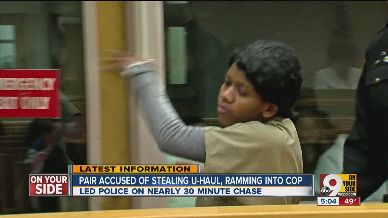 Woman accused of ramming police cruiser gets aggressive in court