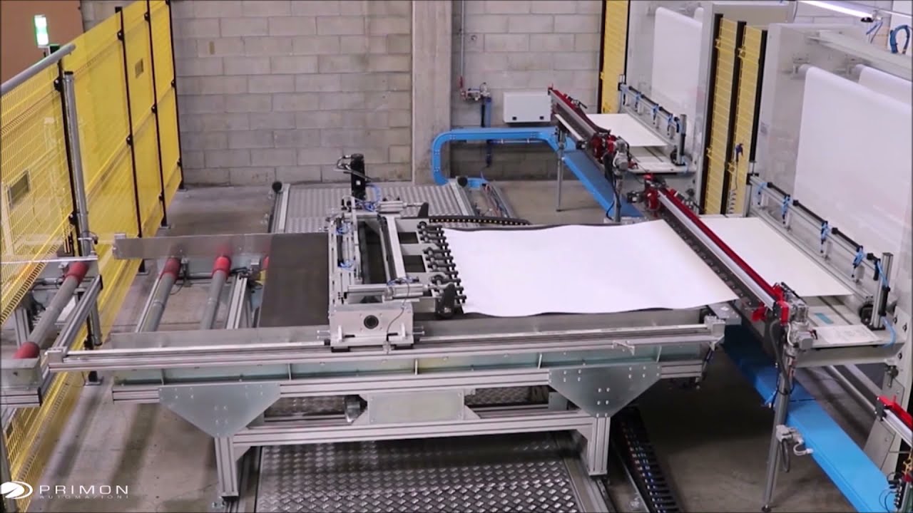 Fabric layering machine