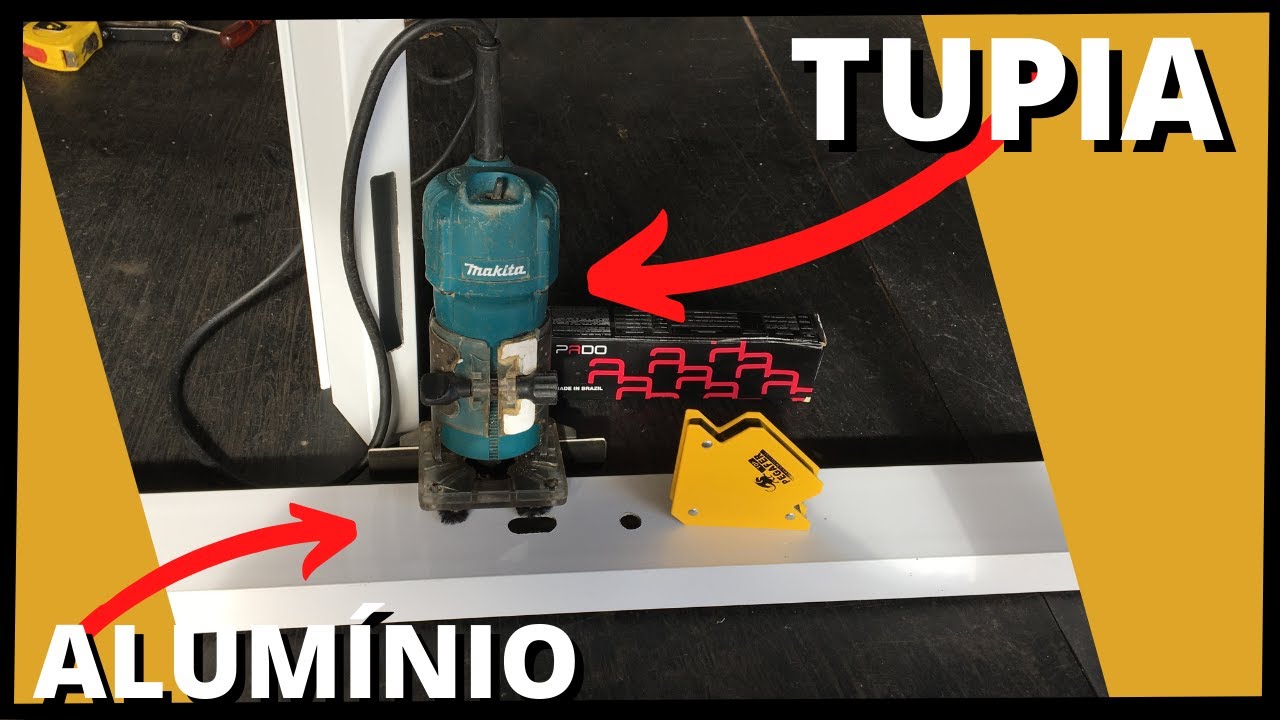 Fechadura em portão de alumínio com tupia.