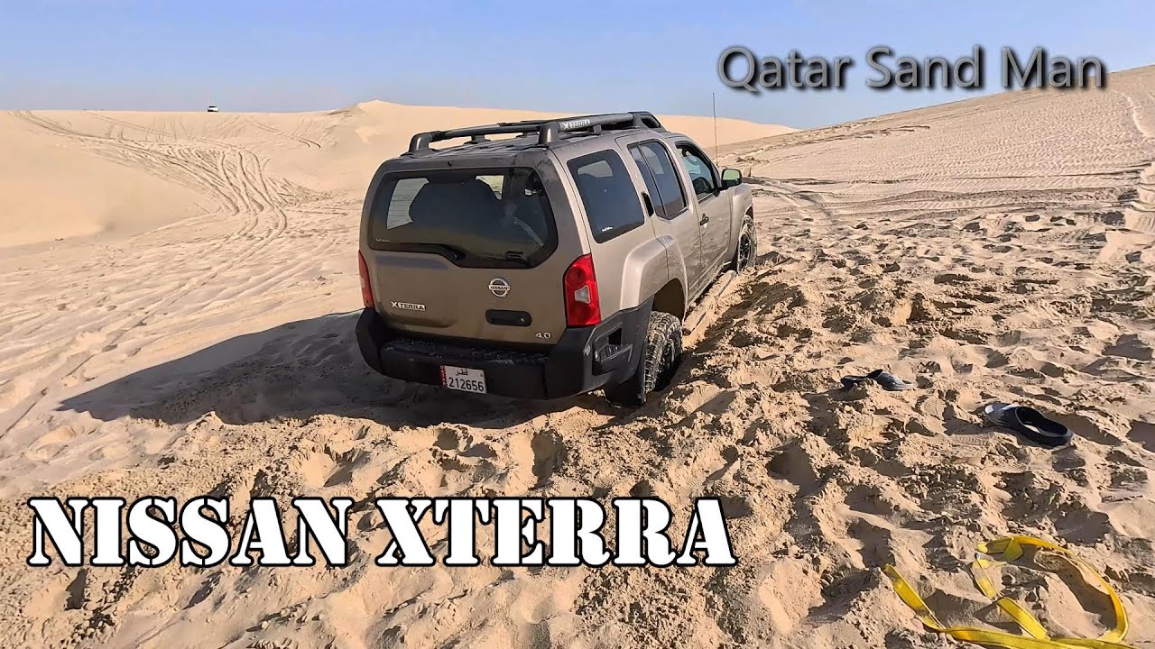 Nissan Xterra recovered from sand dunes. مغرس في سيلين