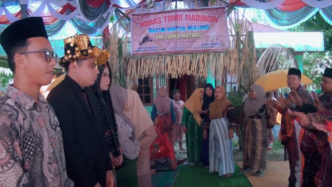 Tortor mora manyorahon happu