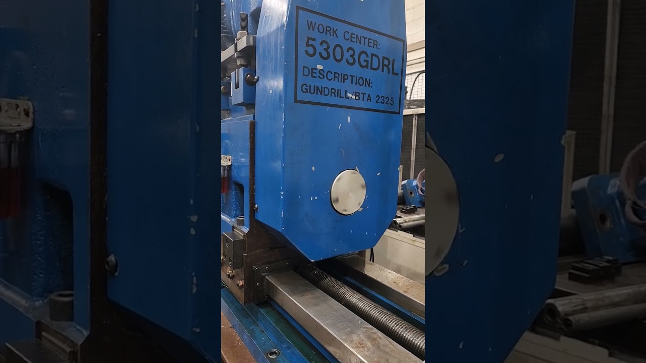 Deep hole drilling, 36mm through 50mm OD 316SS x 2300 mm long, counter rotating work piece.