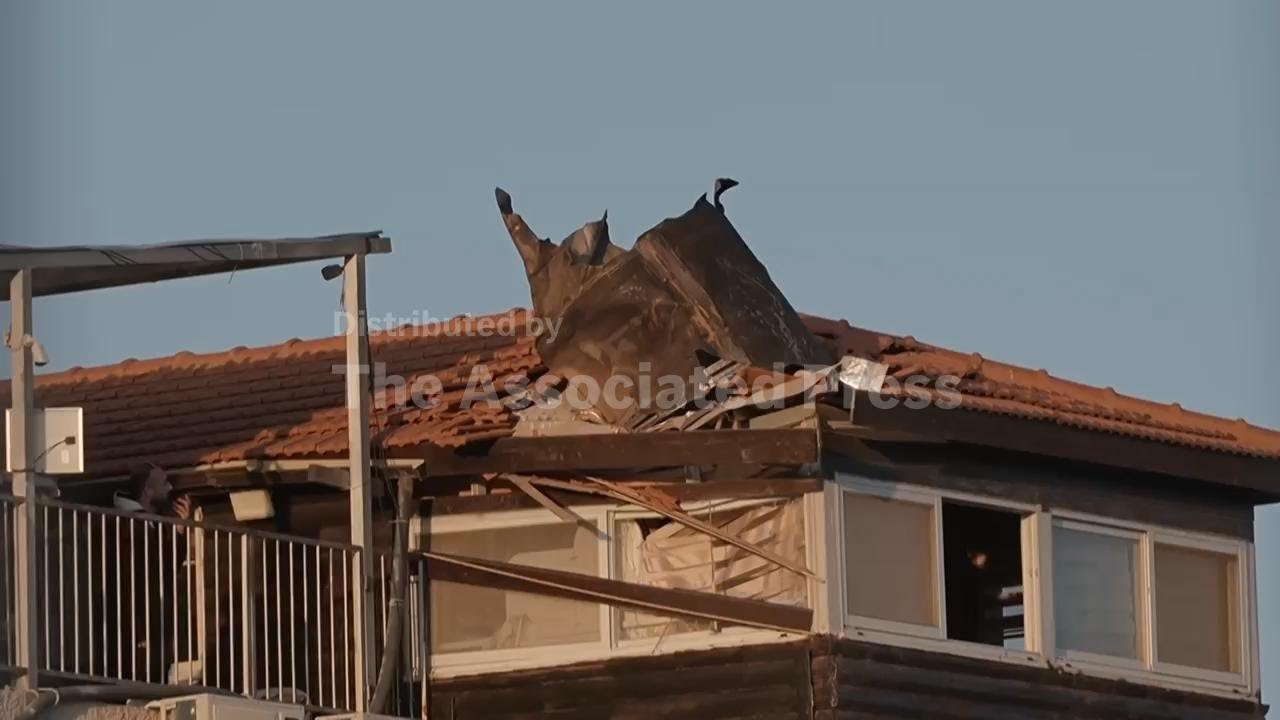 Shrapnel seen on roof in East Jerusalem from interception of Iranian missile