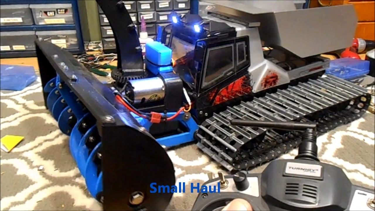 SOLD For sale: Kyosho Blizzard, Heavy metal Tracks, Venom Lipos, 9X radio and snow thrower SOLD