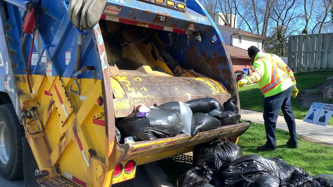Rear load garbage trucks