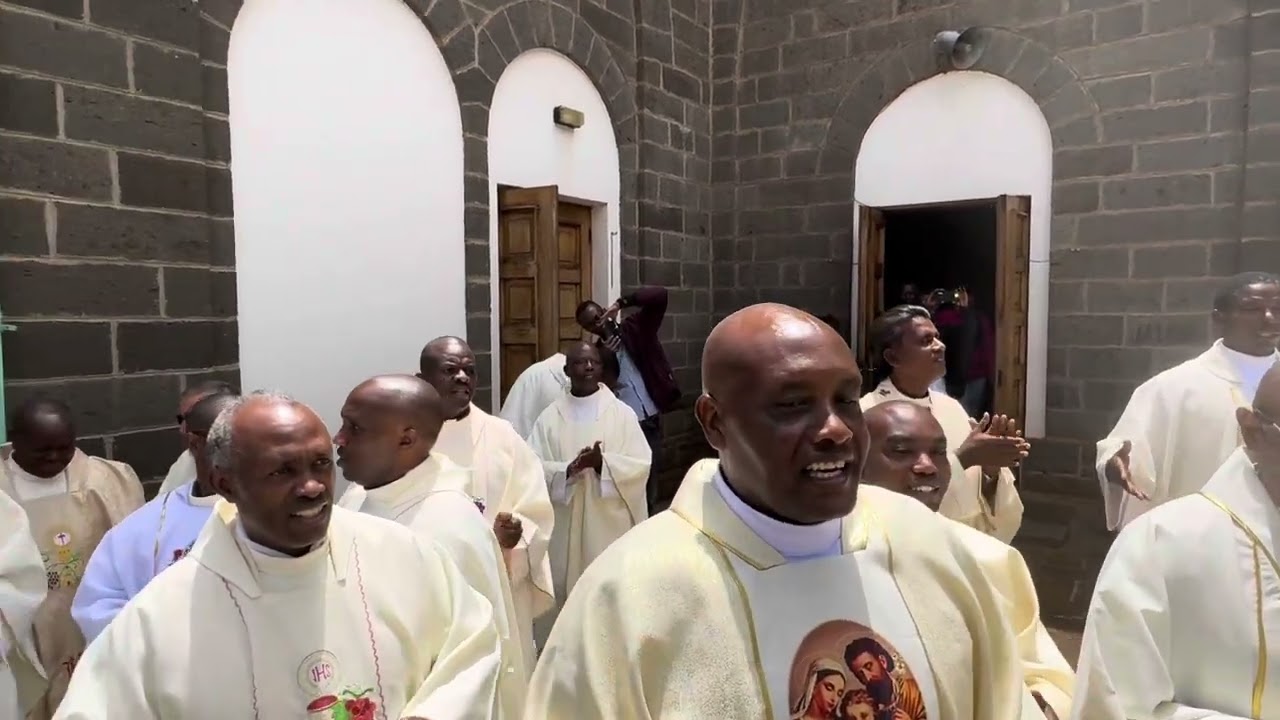 ARCHBISHOP ANTHONY MUHERIA DANCES WITH THE PRIESTS OF NYERI