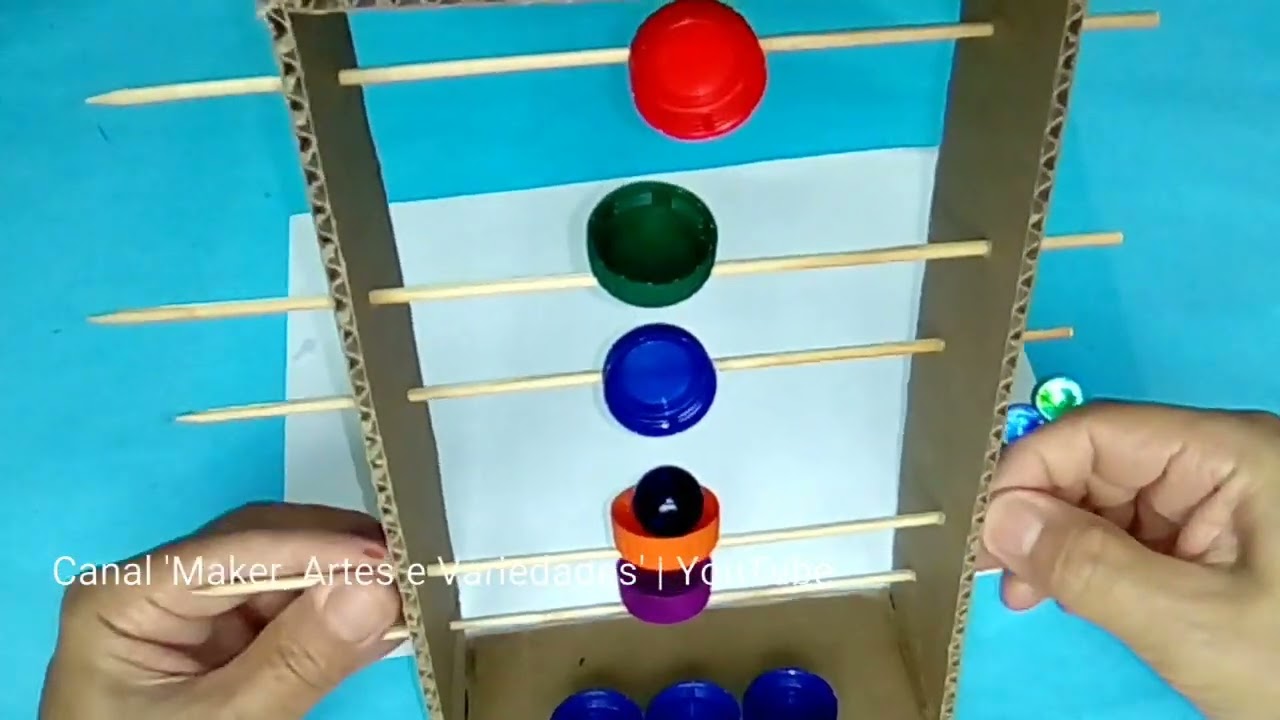 Como fazer um jogo de equilíbrio com tampinhas papelão e materiais descartáveis | jogos recicláveis