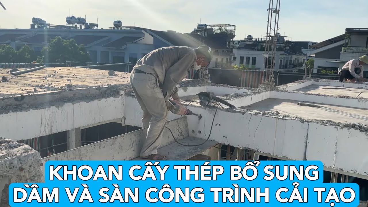 Khoan cấy thép chờ bổ sung dầm và sàn mái bê tông cho công trình cải tạo bằng keo RAMSET G5 PRO.