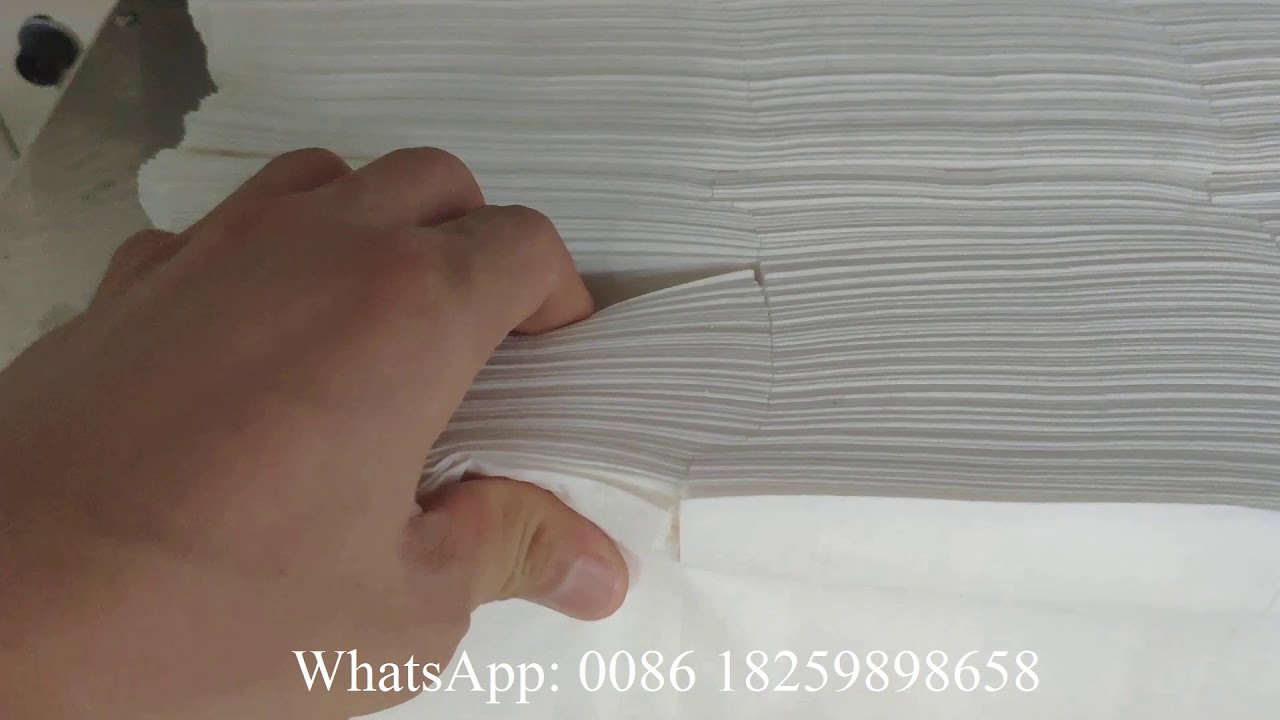 Machine de pliage automatique de papier de soie pour le gaufrage des bords