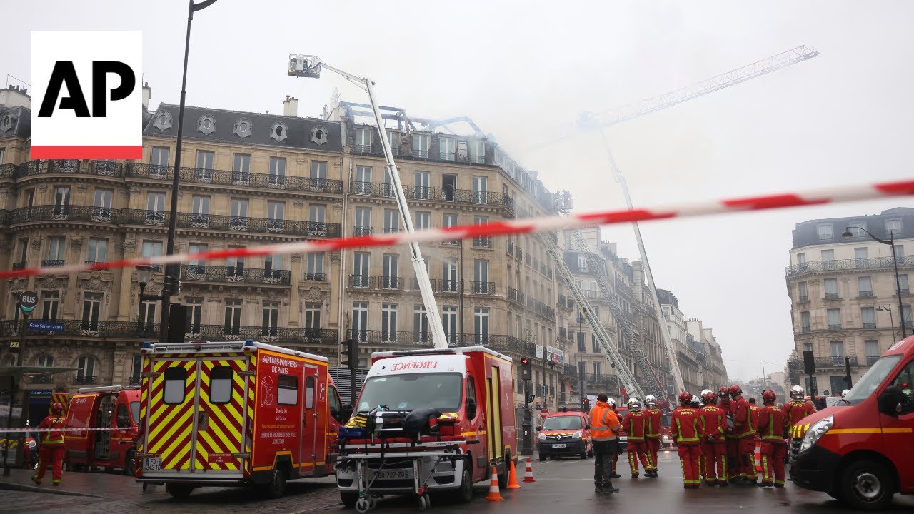 Fire on top floor of residential and office building near Paris train station
