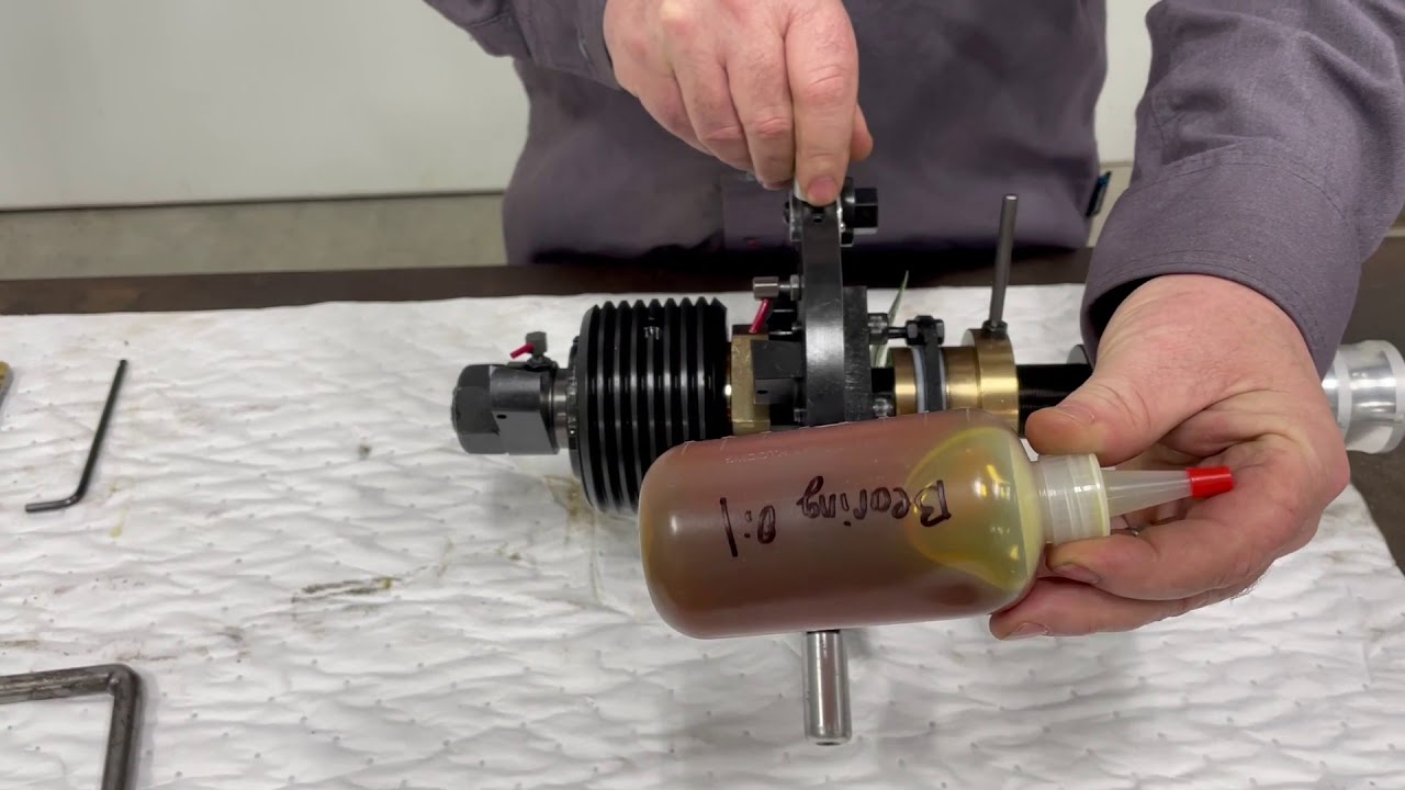How to check the oil on a Samss Refacer  box machine