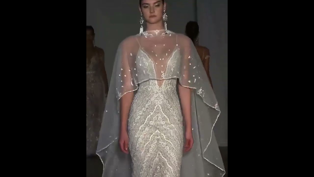 Stunning Embroidered Slip Mermaid Wedding Dress / Bridal Gown with Deep V - Neck Cut .