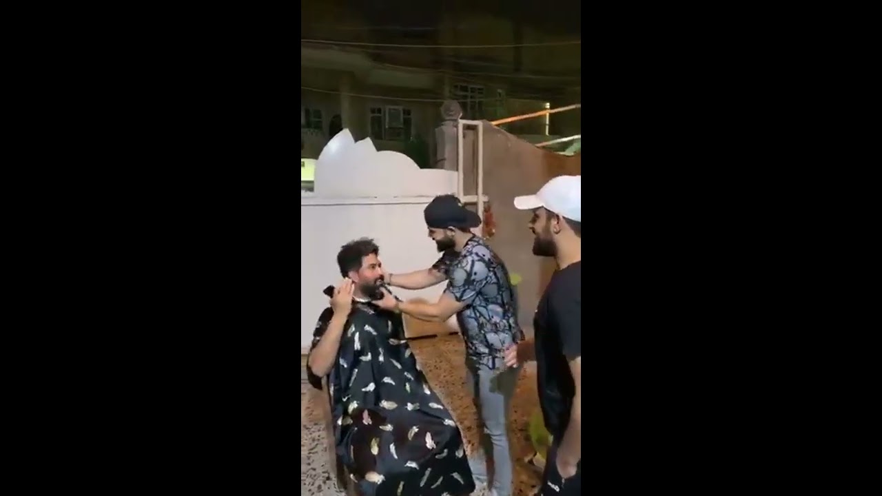 شوفوا علي الدلفي شلون يحلق لأحمد الساعدي