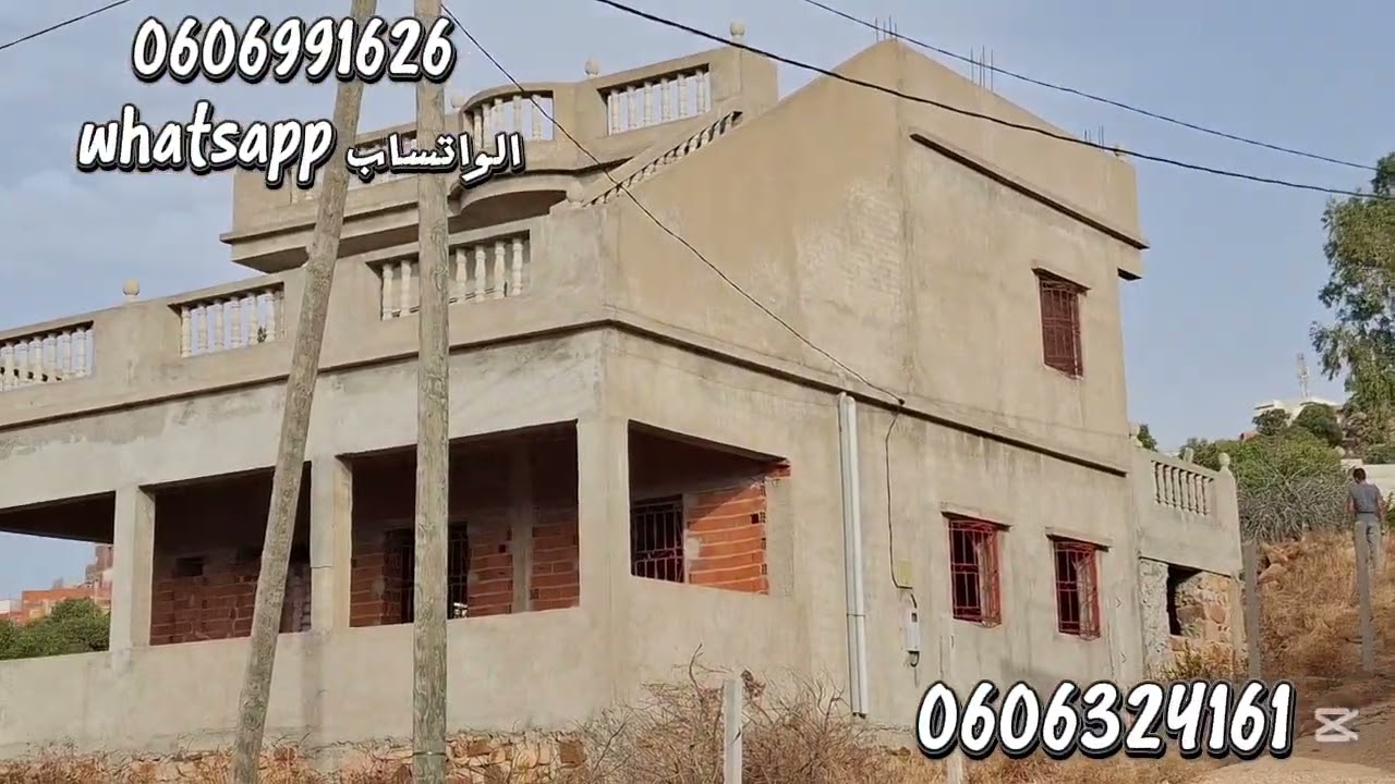 قطعة ارضيه ملكية 500متر فيها دار 100متر 2طبقات واصلا الماء والضوء والطريق في الرمان ملوسة نواحي طنجة