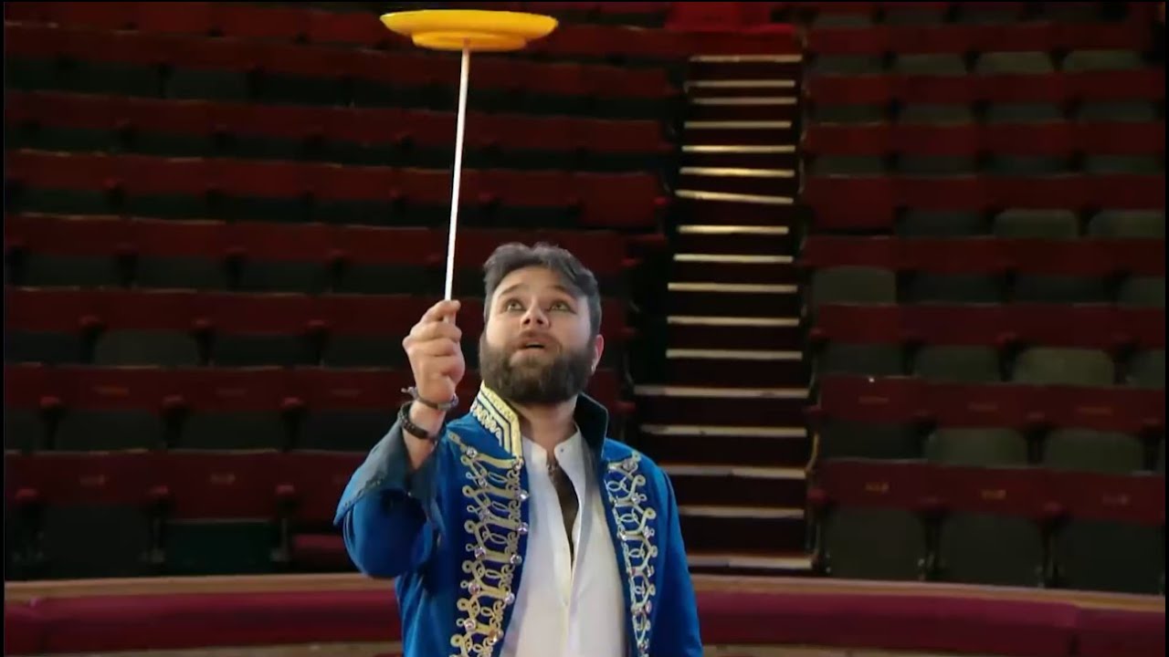 Mr Boo teaches the contestants plate-spinning in the Tower Circus Arena - Four in a Bed (2020)