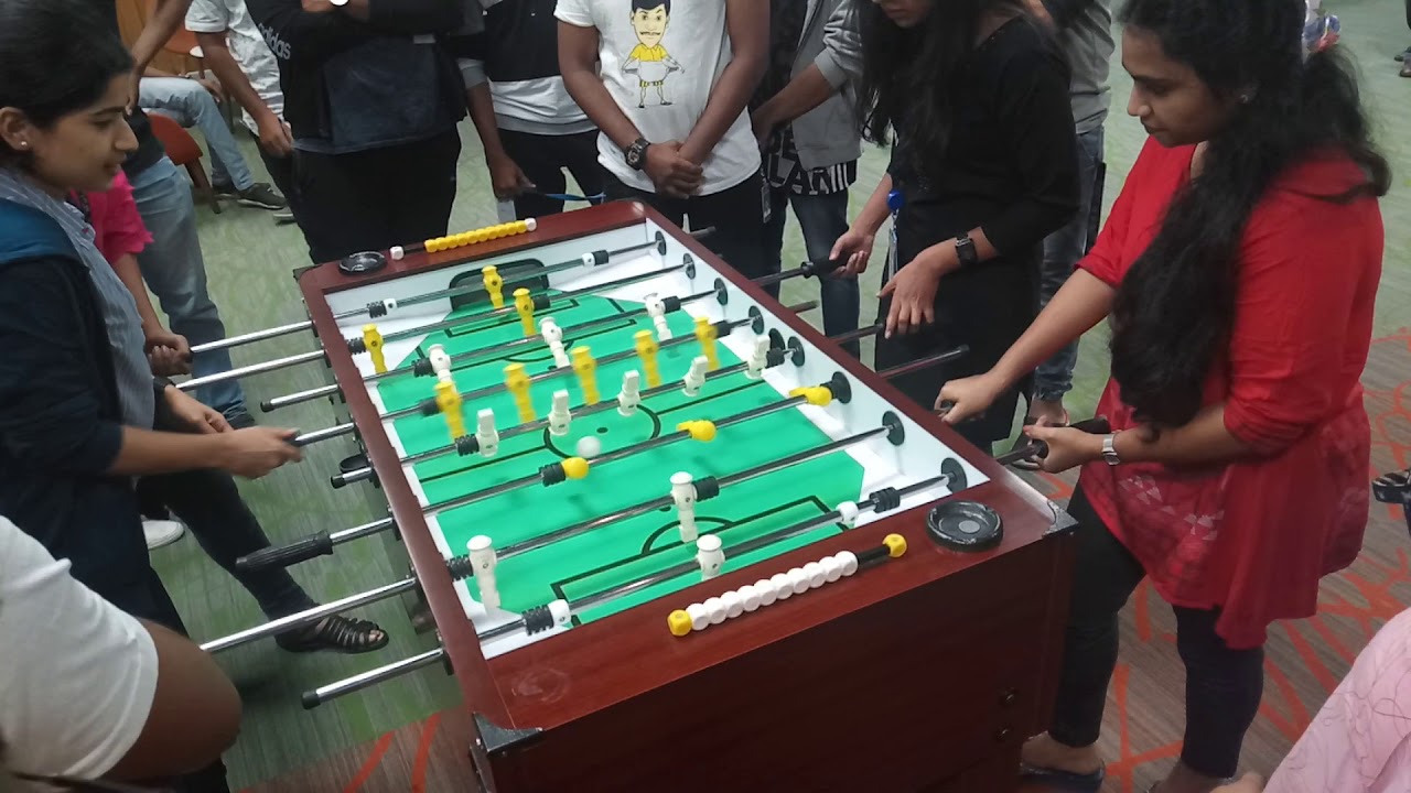 Female players playing Foosball match hosted by Male Anchor Thamizharasan