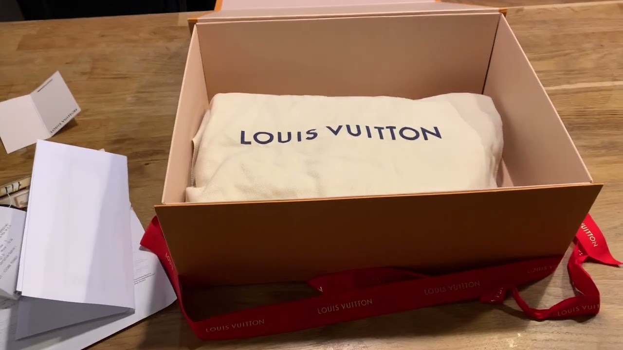 Unboxing authentic Louis Vuitton Oxford Black Bag in calf skin