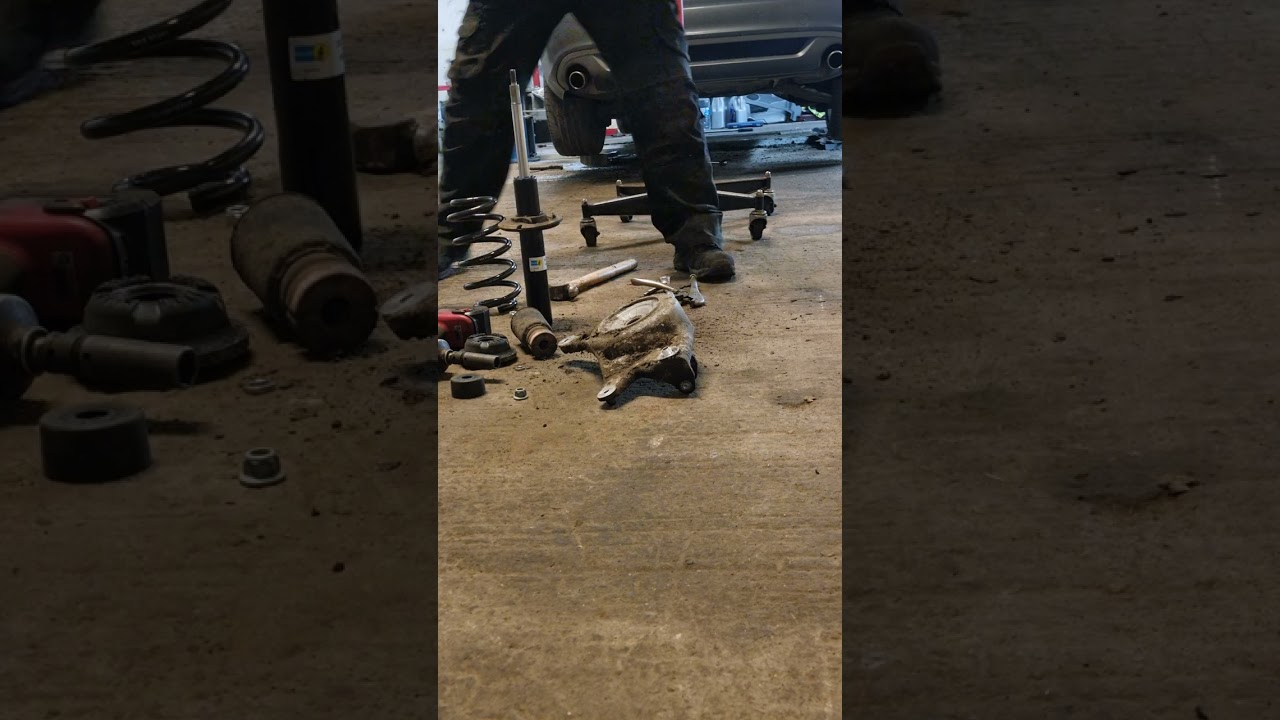 Audi A4 shock and spring replacement no spring compressor required