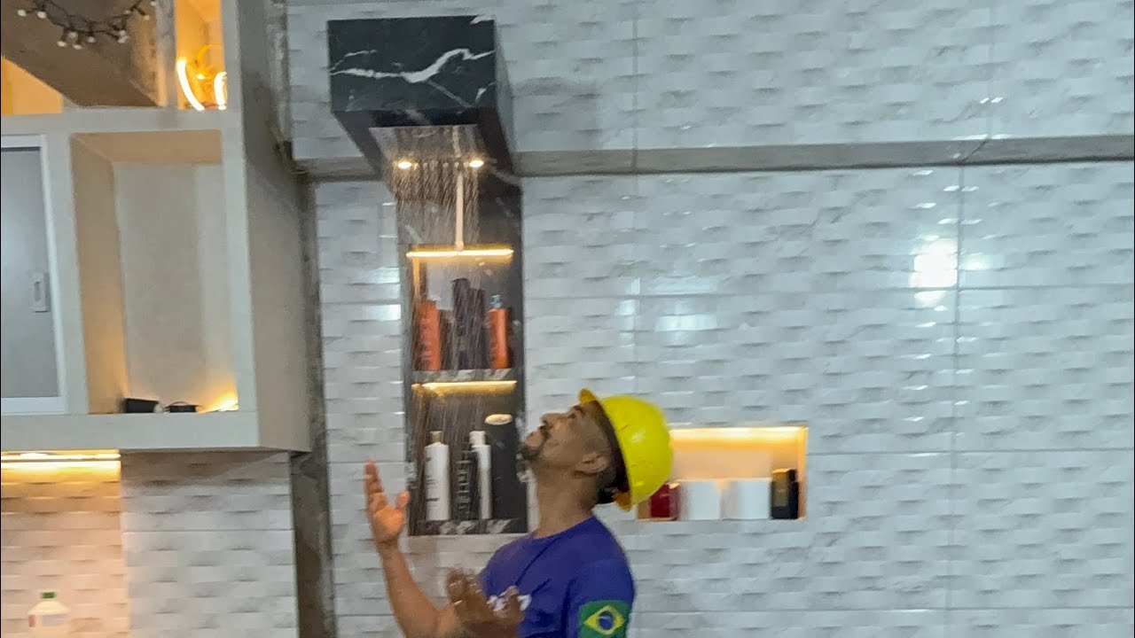 Chuveiro cascata feito com piso passo a passo 