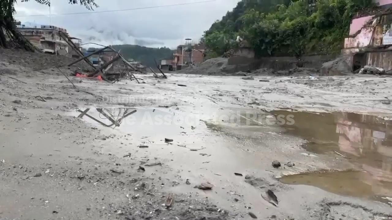 Catastrophic floods leave swathe of destruction in Nepal after glacial collapse