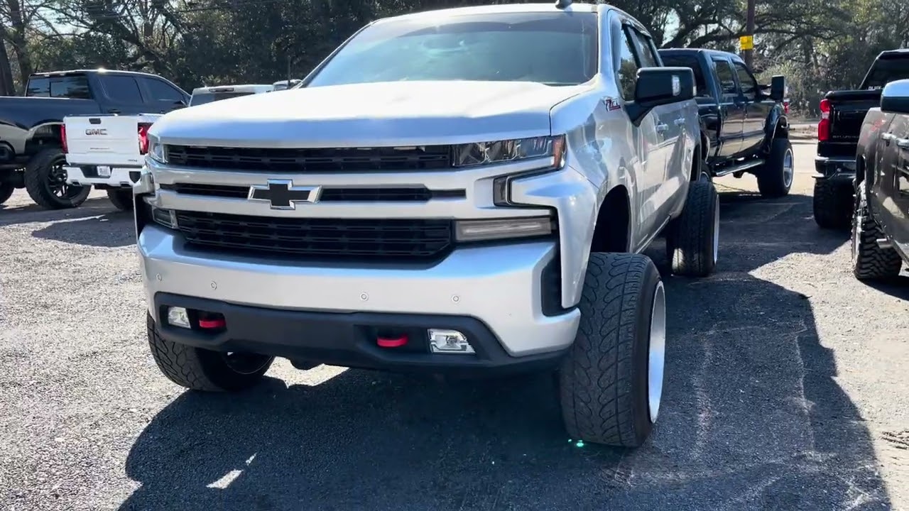 Tons of Aftermarket Lifted Trucks for sale in one location sales / parts / service