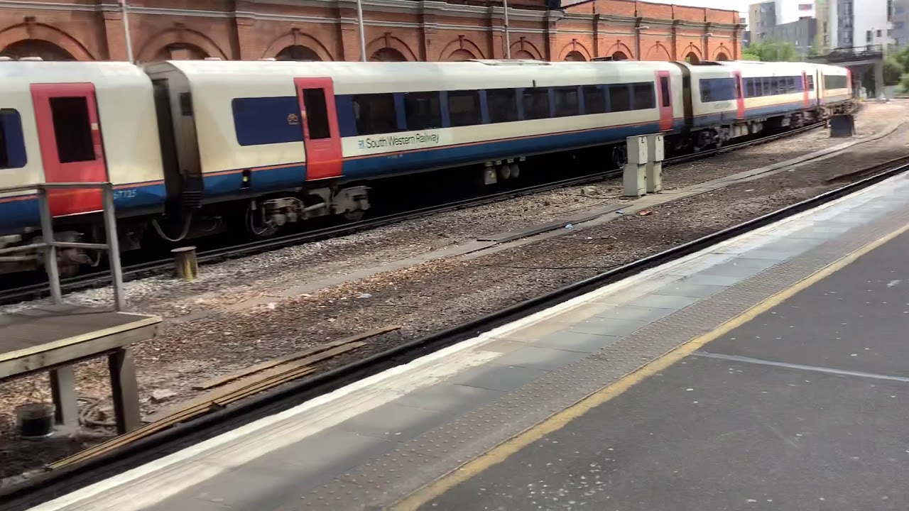 South-western railway class 444 arrives and departs Bournemouth for Poole.