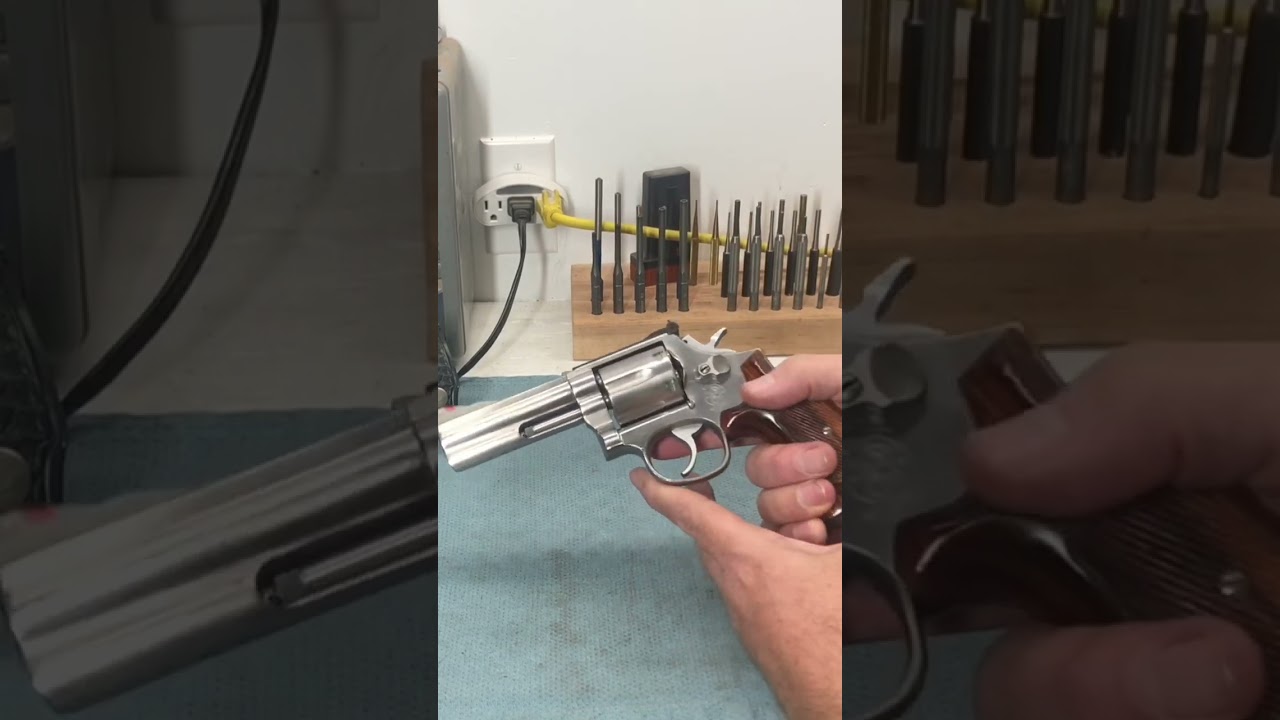 Using a speed loader in a Smith & Wesson revolver.