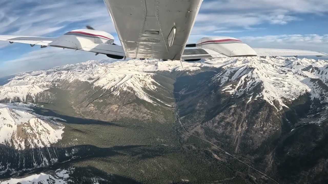 Flying up to and over Independence Pass Colorado in a Piper Seminole