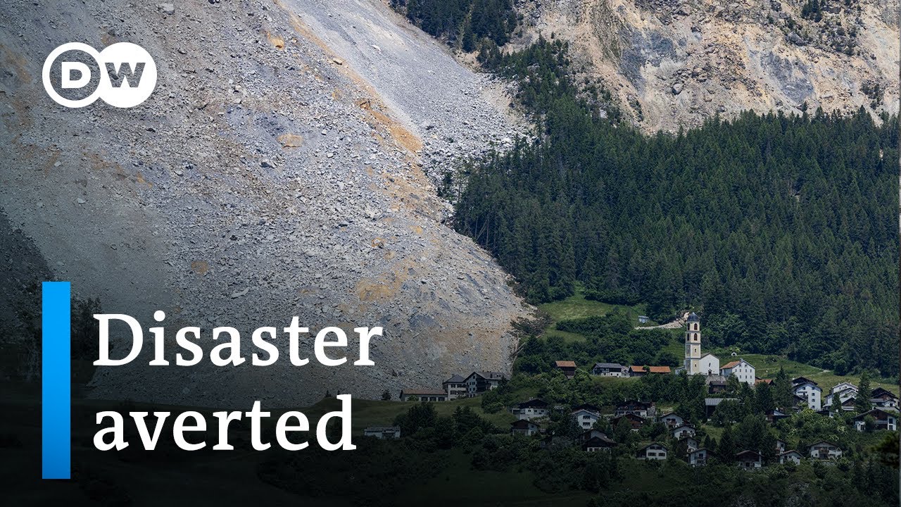 Giant rockslide stops shy of burying entire Swiss village | DW News