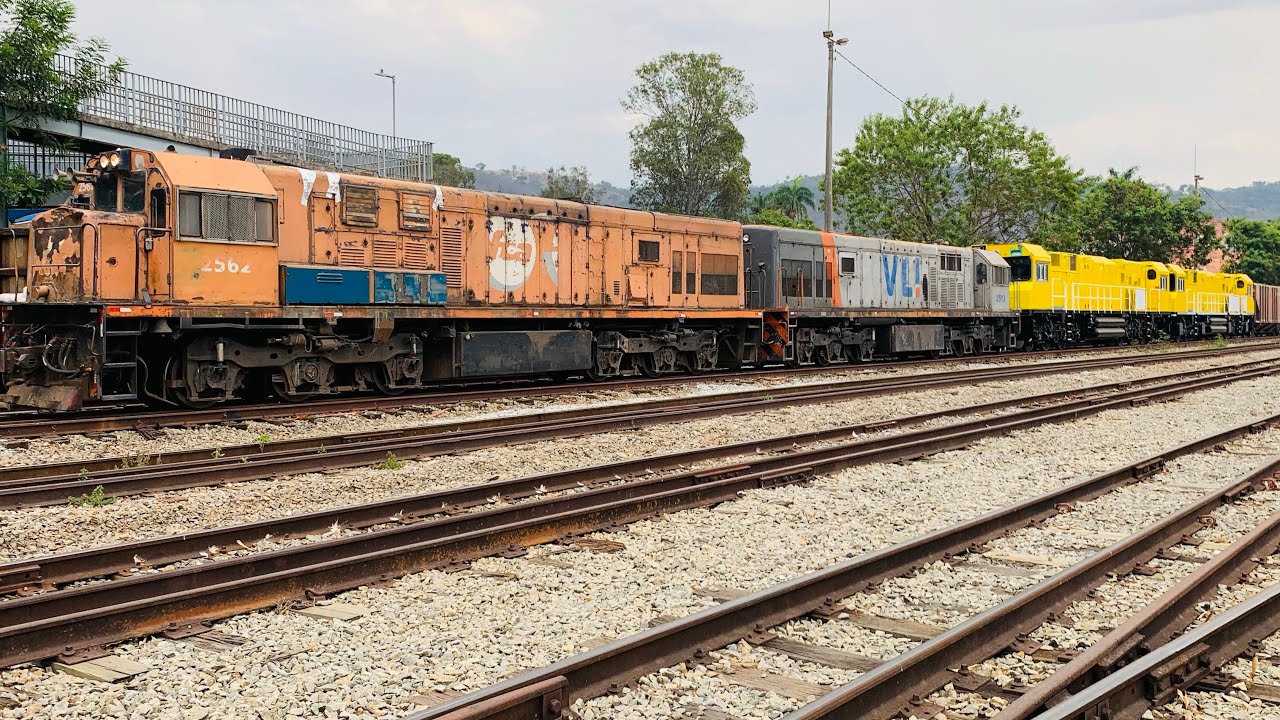 GE U20C chegando em ECA com as novas máquinas amarelas 
