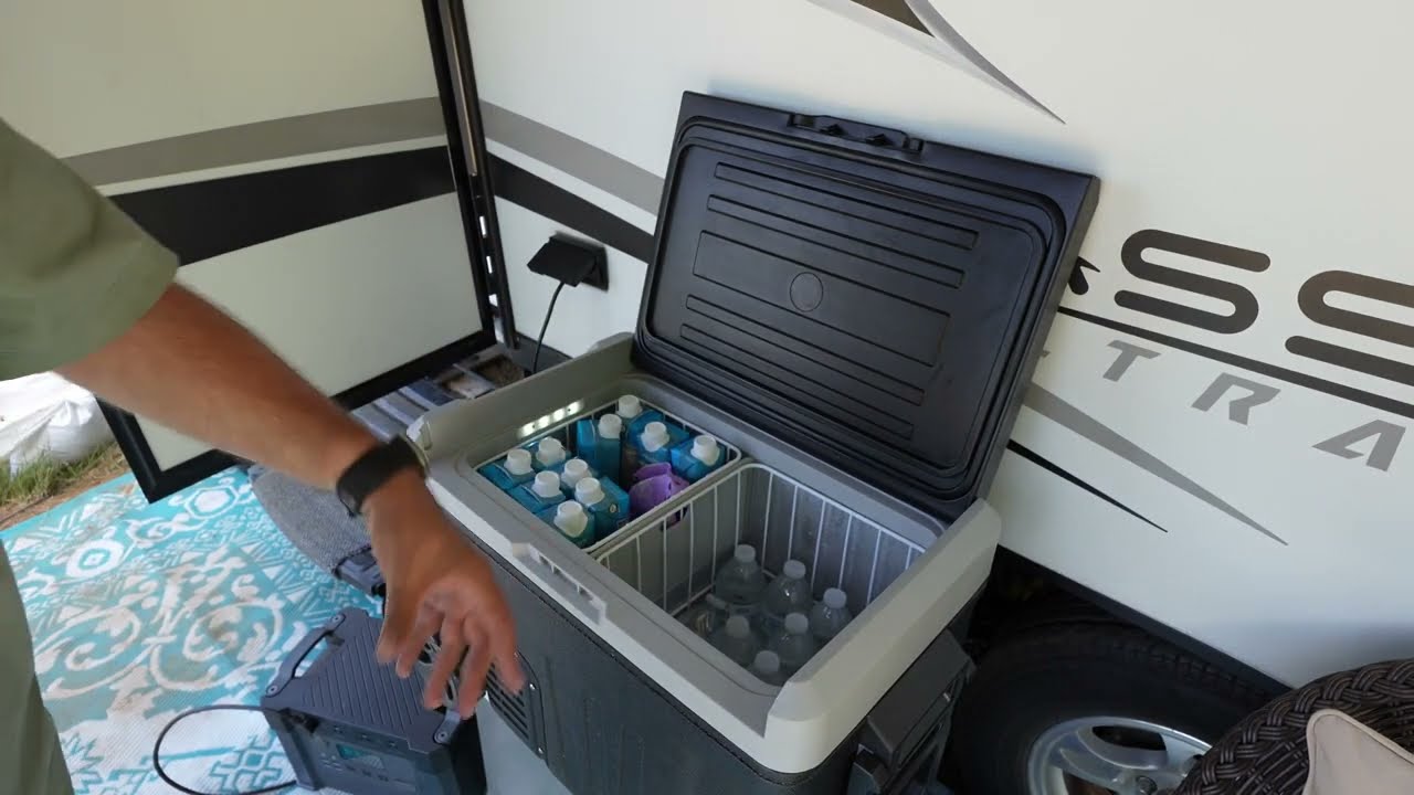 Keep everything cold on the go with this mini car fridge