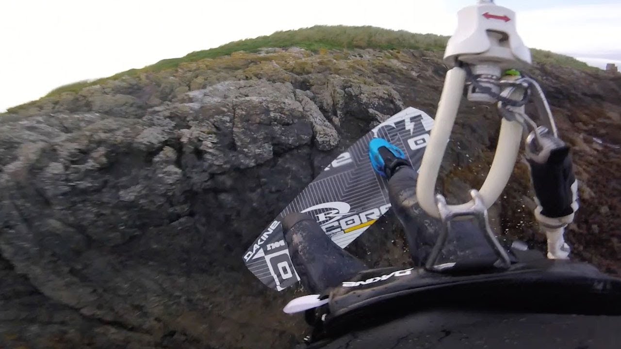 Kiteboarder Performs Amazing Tricks Above Waves