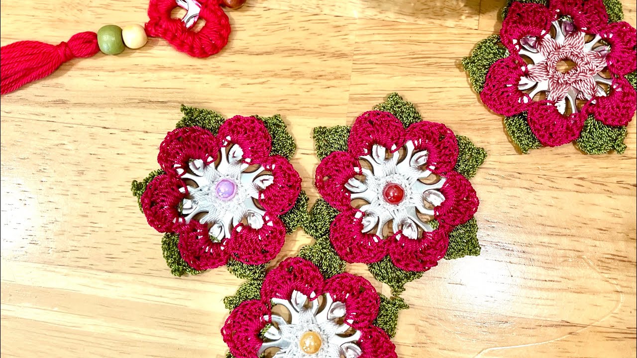 Flores 🌺 con hojas hechas con Anillas de lata.