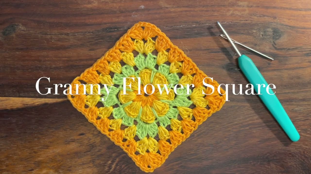 Crocheted Granny Square with a Vibrant Flower 🌼: Step-by-Step Tutorial