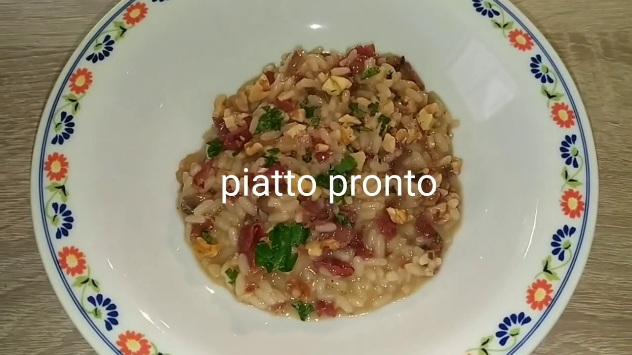 Risotto con bresaola funghi e noci