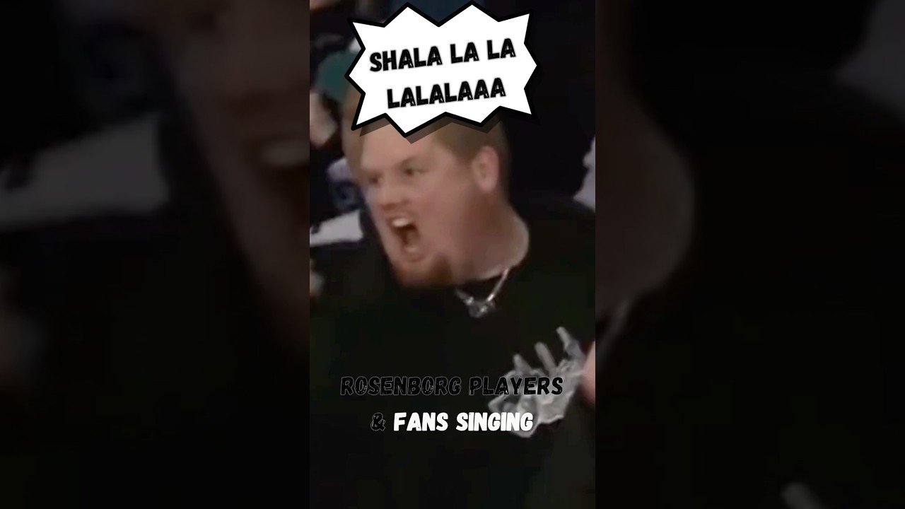 Rosenborg players sing together with the fans 