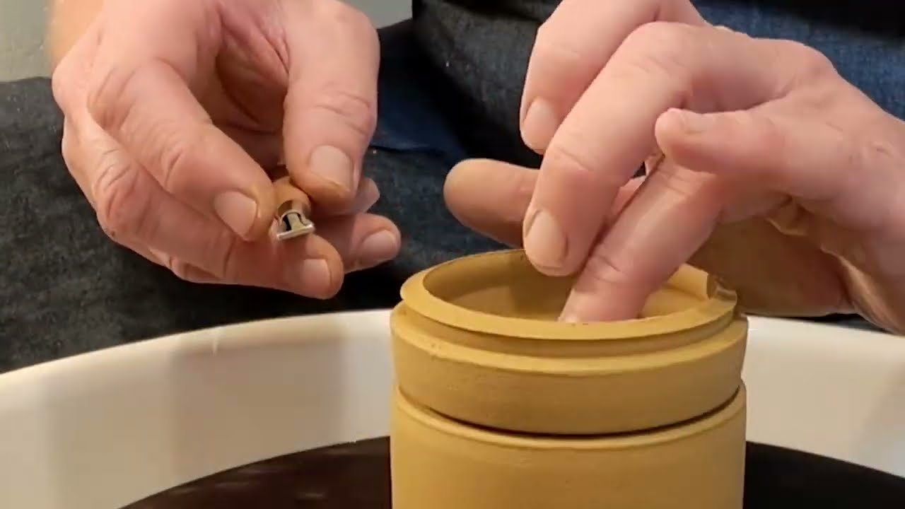 Throwing and trimming a small closed form lidded jar
