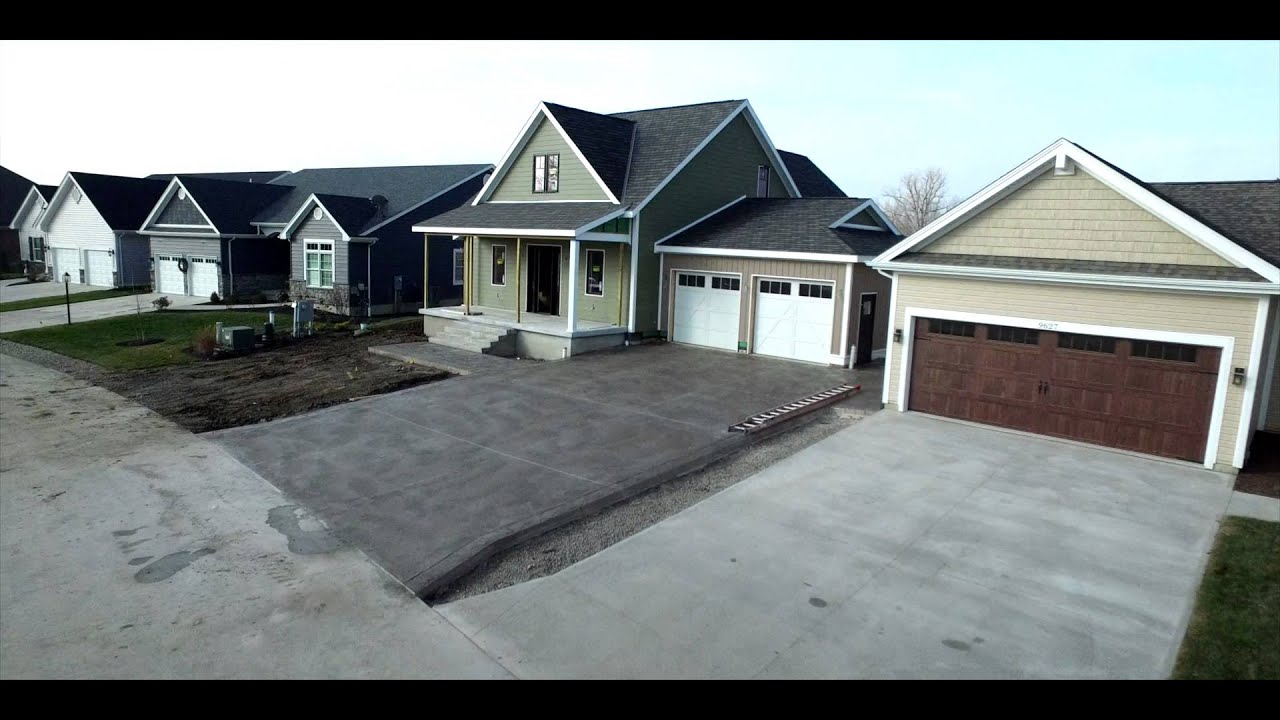 Belle Center Siding featuring Royal® PVC Trim and Celect® Cellular Composite Siding