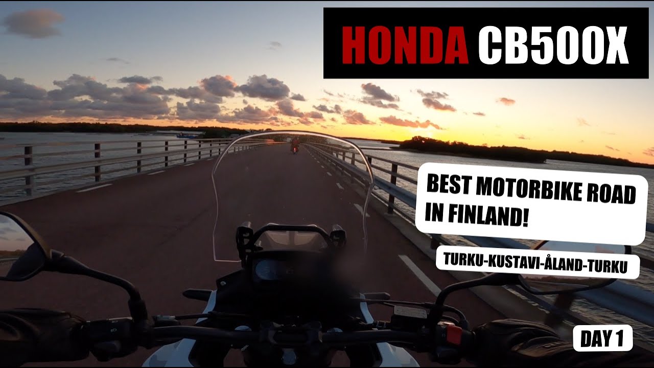 Honda CB500X best motorbike road in Finland, riding with passenger and side carriers.