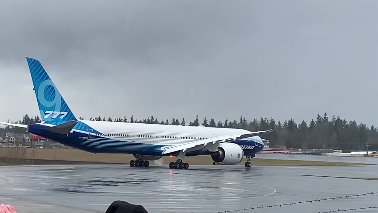 777X folding wingtips descending into position prior to first flight