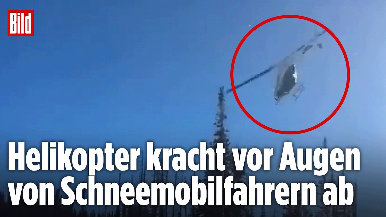 HORROR-ABSTURZ IN DEN USA: Helikopter kracht vor Schneemobil-Fahrern ins Gelände