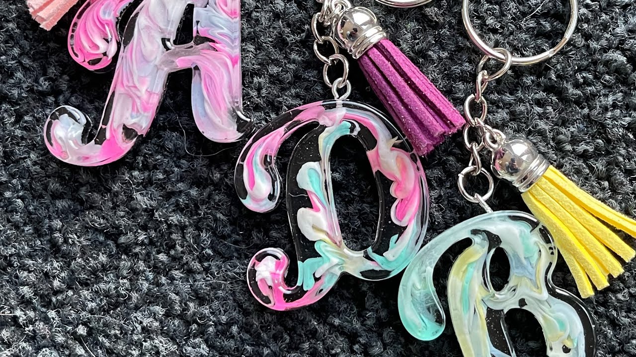 Resin keychain pendant letter with swirls #resin #diy #tutorial #craft #keychain #pendant #creative